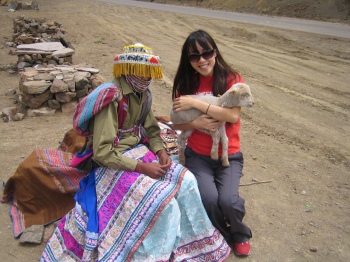 me holding a baby llama